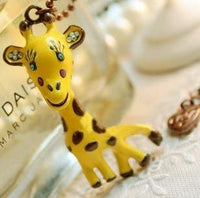 Giraffe Yellow with Green Eyes on Brass Round Necklace